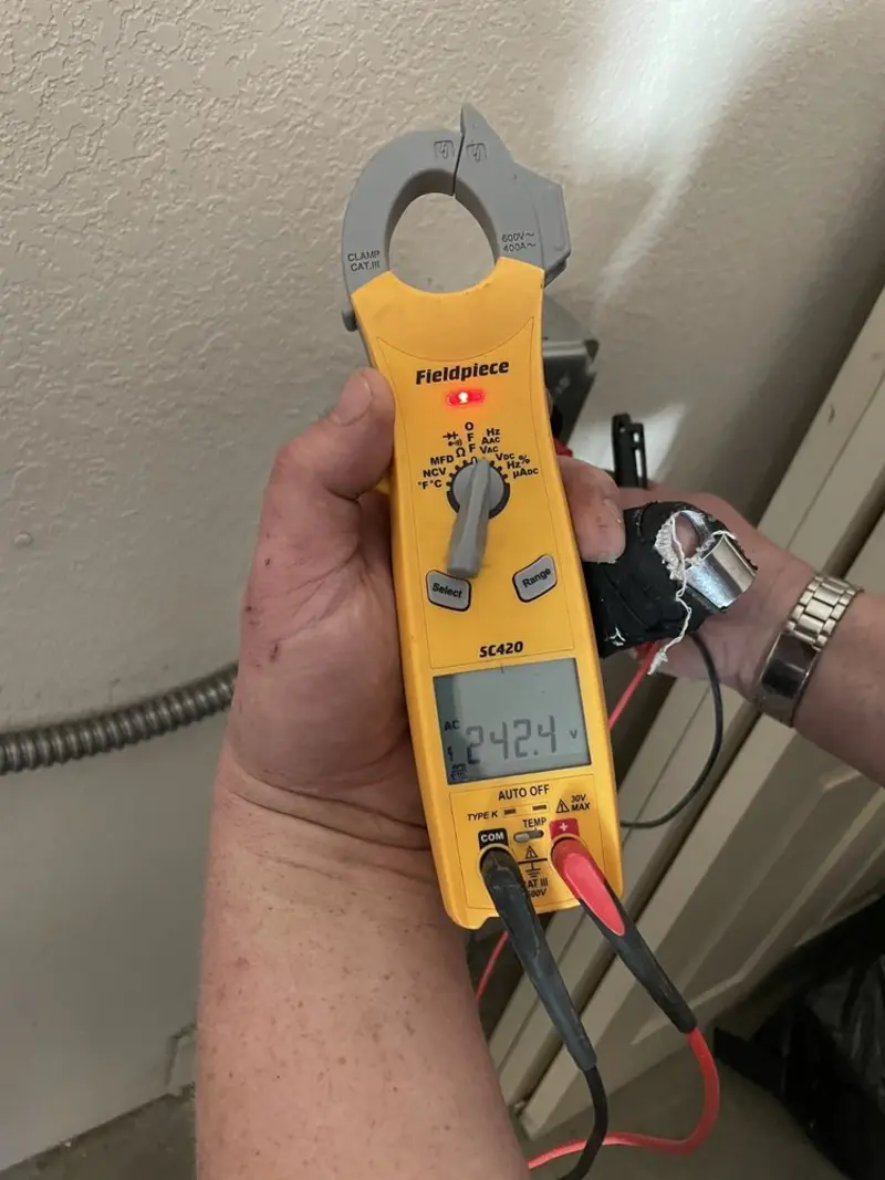 Voltage testing with clamp meter during Generator Installation in Inwood